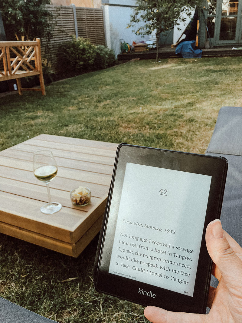 Reading a Kindle in the garden